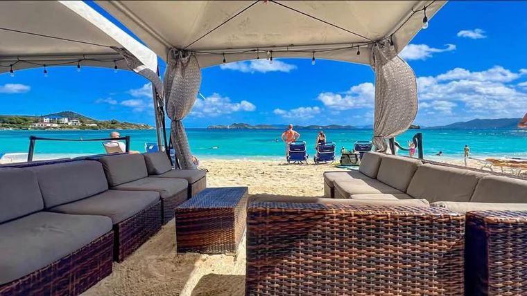 Covered patio lounge looking straight out to the ocean at this step-free vacation rental on St. Thomas